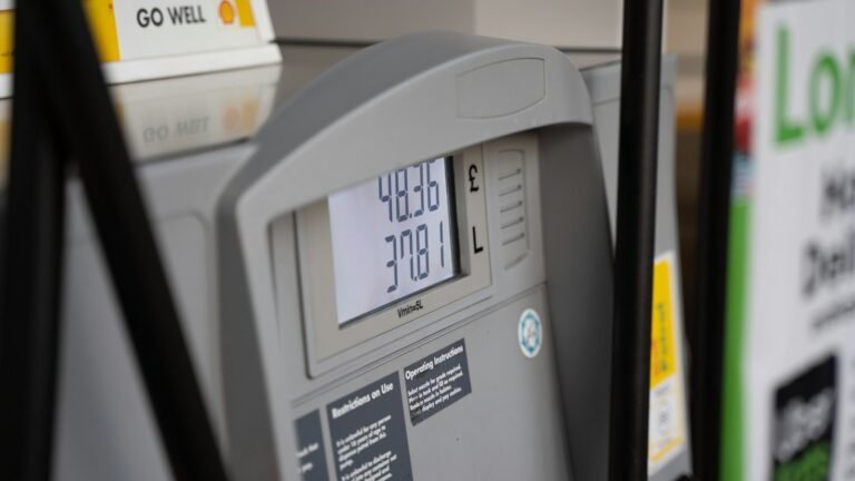 Close-up of a gas pump nozzle at a gas station